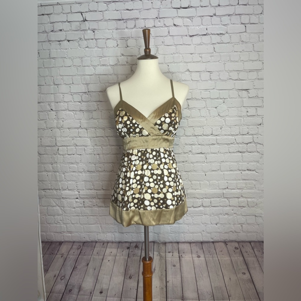 INC silk tank with tie back and adjustable straps. Size 10.